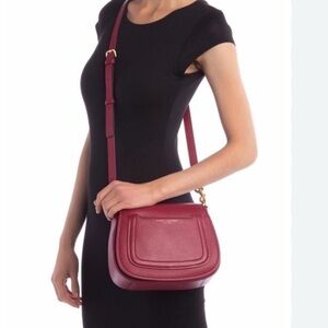 Marc Jacobs Empire City messenger crossbody bag in white pebbled leather.